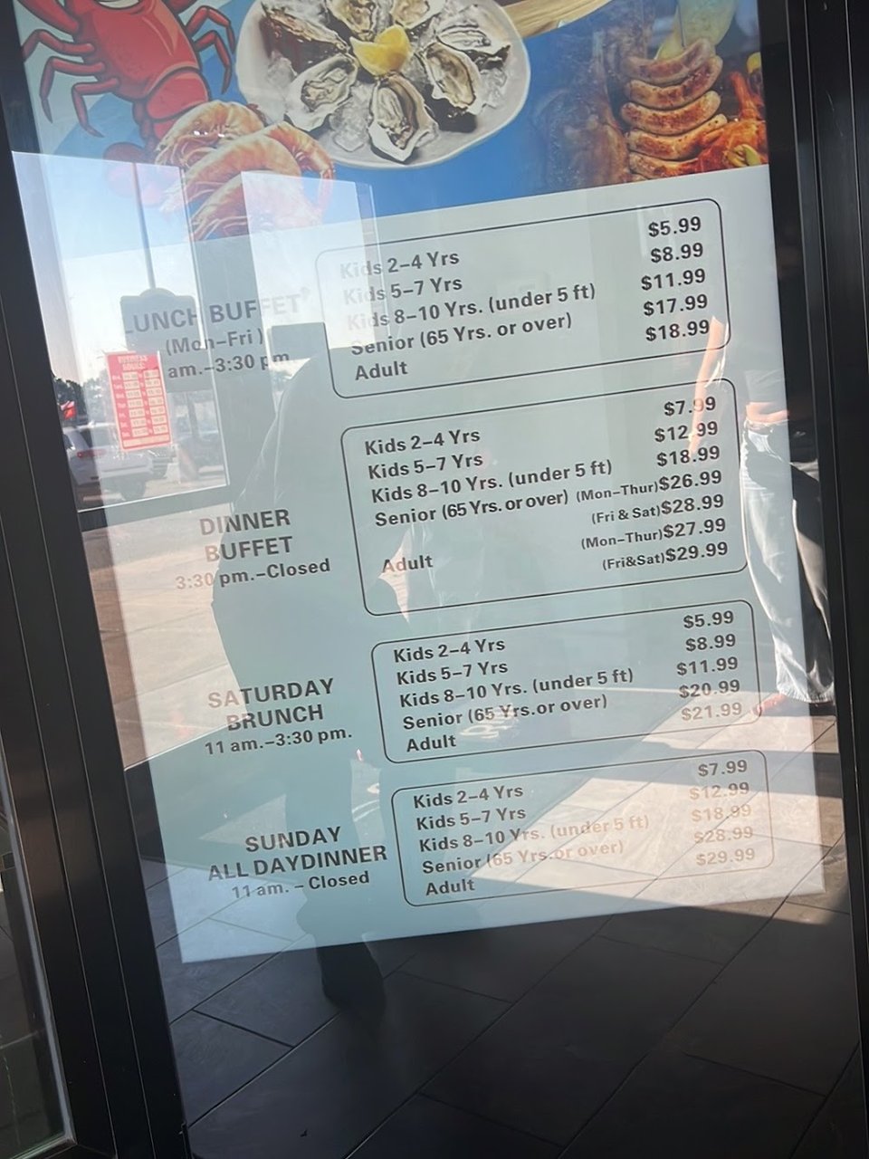 Printed menu with buffet categories and prices.